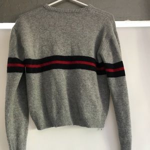 Grey sweater with navy and red stripe